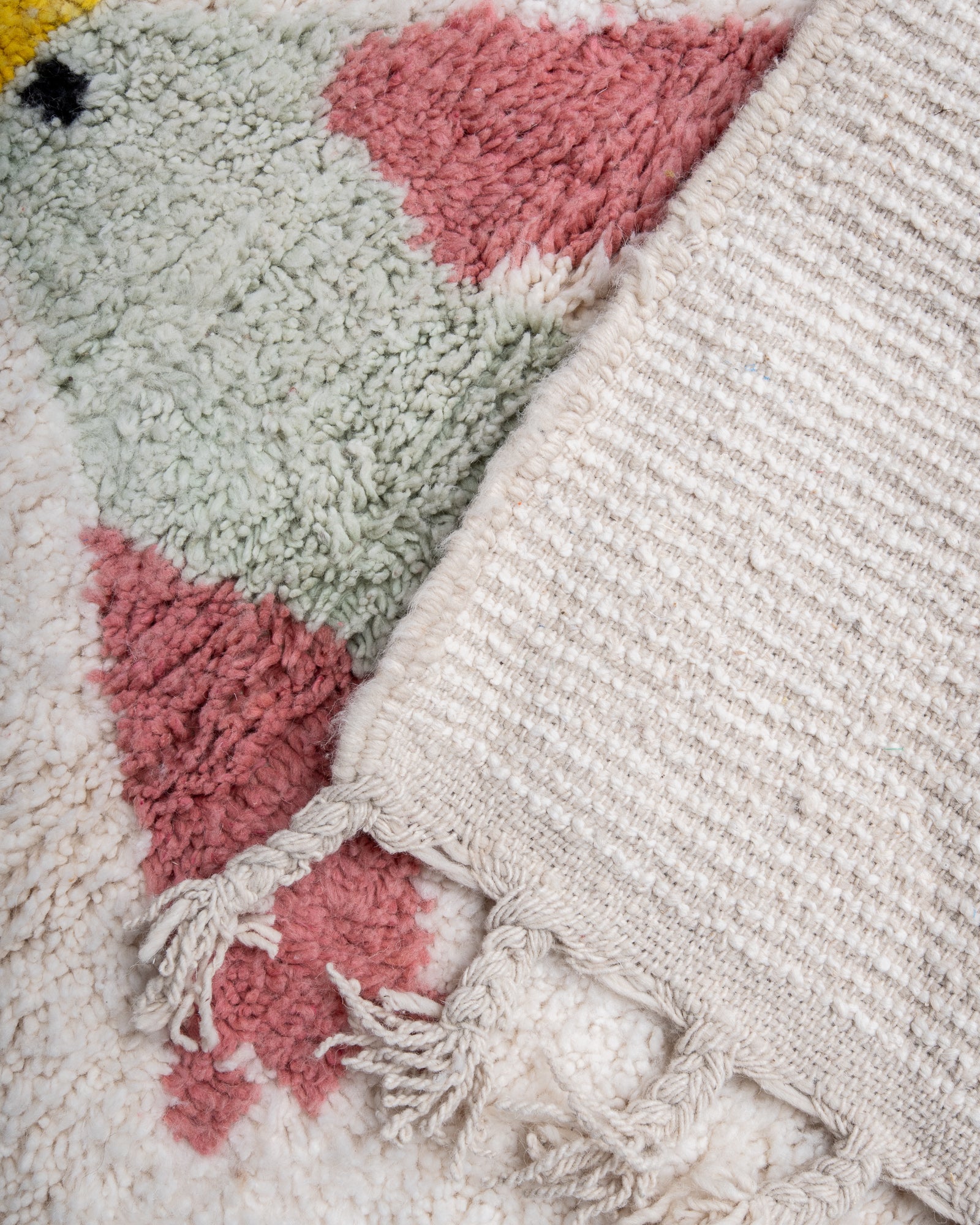 Modern, designer, handcrafted Berber rug from Morocco. Beniourain carpet with beautiful colours and patterns and fluffy wool texture.